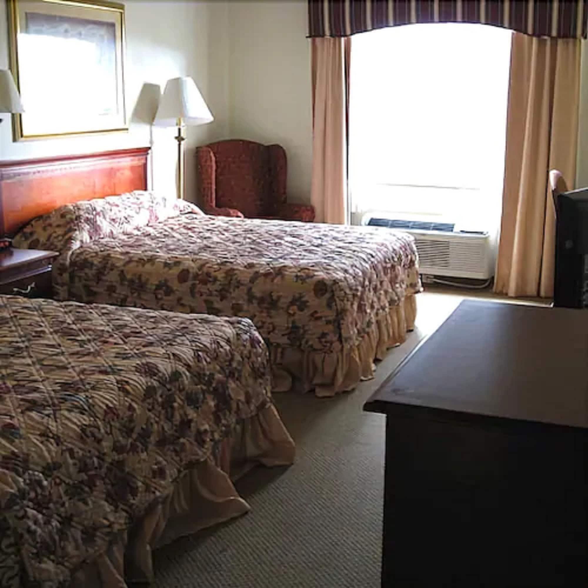 Econo Lodge Inn & Suites Маріанна Номер фото